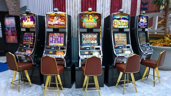 Mobile phone showing sultanmbs live-dealer interface with multiple table options and player information